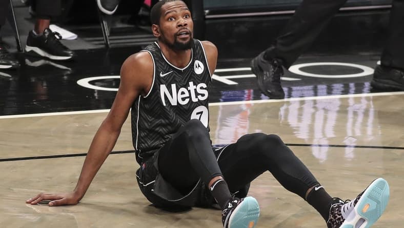 Apr 25, 2021; Brooklyn, New York, USA; Brooklyn Nets forward Kevin Durant (7) looks up after getting fouled in the fourth quarter against the Phoenix Suns at Barclays Center. Mandatory Credit: Wendell Cruz-USA TODAY Sports