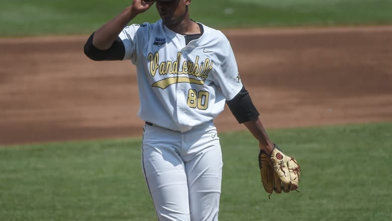 Jun 25, 2021; Omaha, Nebraska, USA; Vanderbilt Commodores starting pitcher Kumar Rocker (80) pitches in the second inning against the NC State Wolfpack at TD Ameritrade Park. Mandatory Credit: Steven Branscombe-USA TODAY Sports
