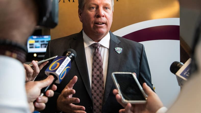 Central Michigan head football coach Jim McElwain talks to reporters during the MAC football media day at Ford Field on Tuesday, July 20, 2021.