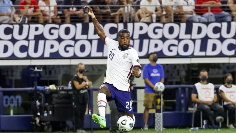 Jul 25, 2021; Arlington, Texas, USA; United States defender Shaquell Moore (20) tries to controls the ball during the first half against Jamaica in a CONCACAF Gold Cup quarterfinal soccer match at AT&T Stadium. Mandatory Credit: Kevin Jairaj-USA TODAY Sports