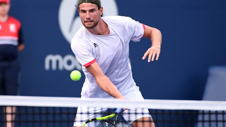 Aug 7, 2021; Toronto, Ontario, Canada; Maxime Cressy of the United States plays a shot against Feliciano Lopez of Spain in first round qualifying play for the National Bank Open at the Aviva Centre. Mandatory Credit: Dan Hamilton-USA TODAY Sports