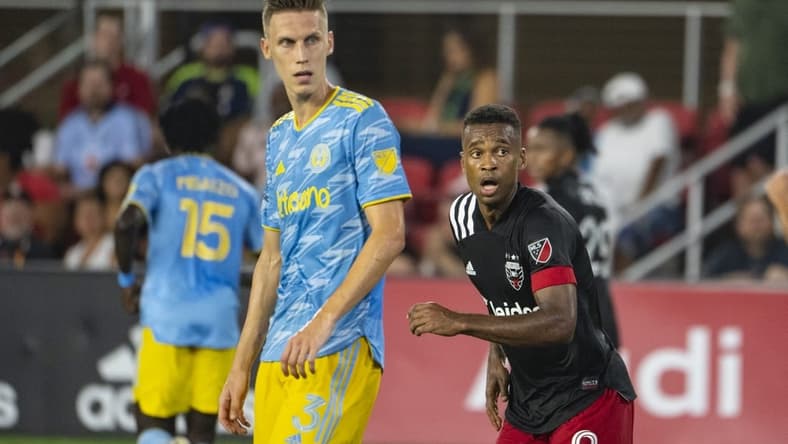 Aug 28, 2021; Washington, DC, Washington, DC, USA;  D.C. United forward Ola Kamara (9) and Philadelphia Union defender Jack Elliott (3) look down field at Audi Field. Mandatory Credit: Tommy Gilligan-USA TODAY Sports