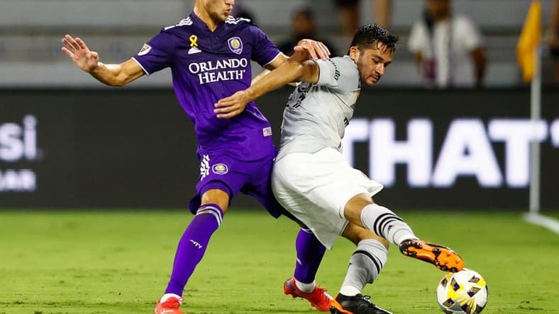 Sep 15, 2021; Orlando, Florida, USA;  CF Montreal midfielder Mathieu Choiniere (29) controls the ball against Orlando City forward Silvester van der Water (14) in the first half at Orlando City Stadium. Mandatory Credit: Nathan Ray Seebeck-USA TODAY Sports