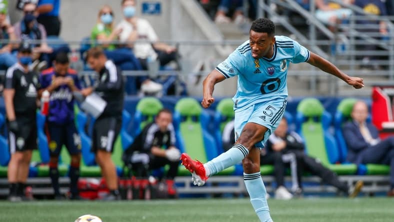 Sep 11, 2021; Seattle, Washington, USA; Minnesota United FC midfielder Jacori Hayes (5) attempts a shot against the Seattle Sounders FC during the second half at CenturyLink Field. Mandatory Credit: Joe Nicholson-USA TODAY Sports