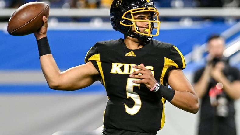 Detroit King's Dante Moore throws a pass against DeWitt during the third quarter on Saturday, Nov. 27, 2021, at Ford Field in Detroit.

211127 Dewitt Detroit King 069a