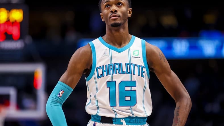 Dec 13, 2021; Dallas, Texas, USA; Charlotte Hornets guard Scottie Lewis (16) reacts during the second half against the Dallas Mavericks at American Airlines Center. Mandatory Credit: Kevin Jairaj-USA TODAY Sports