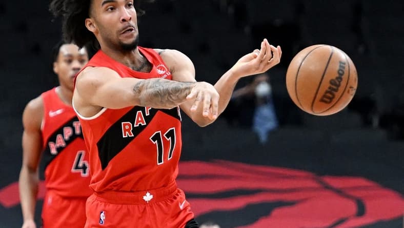 Jan 23, 2022; Toronto, Ontario, CAN; Toronto Raptors forward Justin Champagnie (11) passes the ball against Portland Trail Blazers in the second half at Scotiabank Arena. Mandatory Credit: Dan Hamilton-USA TODAY Sports