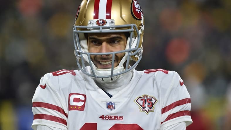 Jan 22, 2022; Green Bay, Wisconsin, USA; San Francisco 49ers quarterback Jimmy Garoppolo (10) in action against the Green Bay Packers during a NFC Divisional playoff football game at Lambeau Field. Mandatory Credit: Jeffrey Becker-USA TODAY Sports
