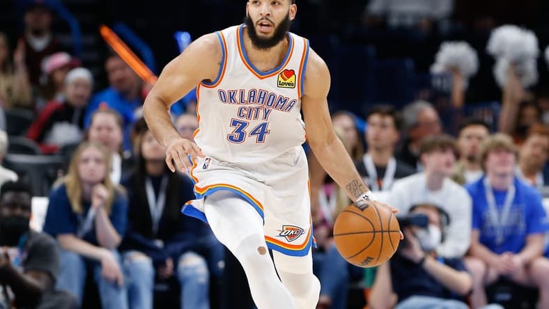 Feb 9, 2022; Oklahoma City, Oklahoma, USA; Oklahoma City Thunder forward Kenrich Williams (34) dribbles the ball down the court against the Toronto Raptors during the second half at Paycom Center. Toronto won 117-98. Mandatory Credit: Alonzo Adams-USA TODAY Sports
