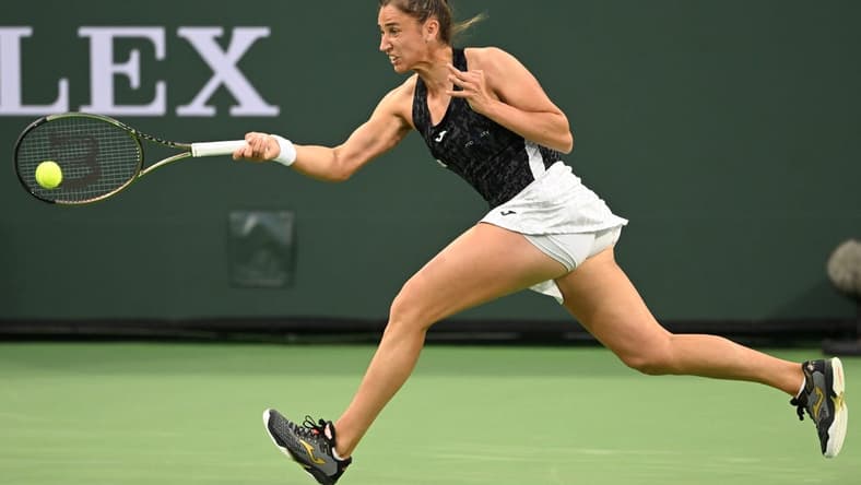 Mar 14, 2022; Indian Wells, CA, USA; Sara Sorribes Tormo (ESP) hits a shot in her third round match against Paula Badosa (not pictured) during the BNP Paribas Open at the Indian Wells Tennis Garden. Mandatory Credit: Jayne Kamin-Oncea-USA TODAY Sports