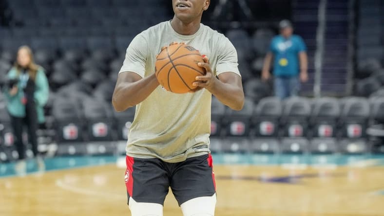 Mar 16, 2022; Charlotte, North Carolina, USA; Atlanta Hawks center Gorgui Dieng (10) during pregame warm ups before the game between the Charlotte Hornets and the Atlanta Hawks at the Spectrum Center. Mandatory Credit: Jim Dedmon-USA TODAY Sports