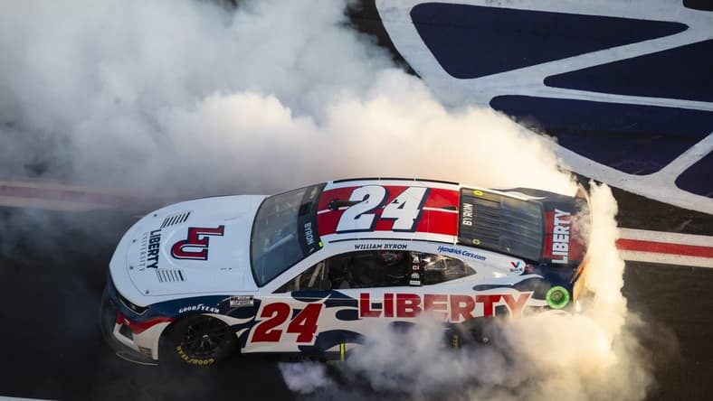 Mar 20, 2022; Hampton, Georgia, USA; NASCAR Cup Series driver William Byron celebrates after winning the Folds of Honor QuikTrip 500 at Atlanta Motor Speedway. Mandatory Credit: Mark J. Rebilas-USA TODAY Sports