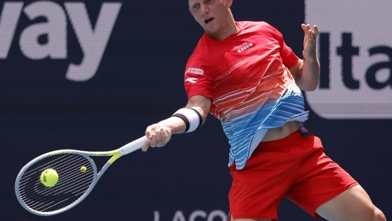 Mar 24, 2022; Miami Gardens, FL, USA; Alejandro Davidovich Fokina (ESP) hits a forehand against Sebastian Korda (USA) (not pictured) in a first round men's singles match in the Miami Open at Hard Rock Stadium. Mandatory Credit: Geoff Burke-USA TODAY Sports