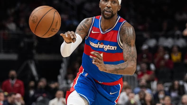 Apr 6, 2022; Atlanta, Georgia, USA; Washington Wizards guard Kentavious Caldwell-Pope (1) passes the ball against the Atlanta Hawks during the first half at State Farm Arena. Mandatory Credit: Dale Zanine-USA TODAY Sports