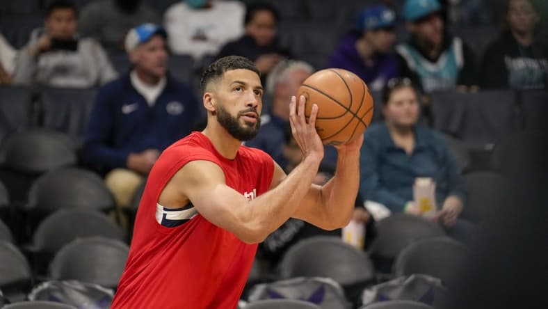 Apr 10, 2022; Charlotte, North Carolina, USA; Washington Wizards forward Anthony Gill (16) warms up during the first quarter against the Charlotte Hornets at Spectrum Center. Mandatory Credit: Jim Dedmon-USA TODAY Sports