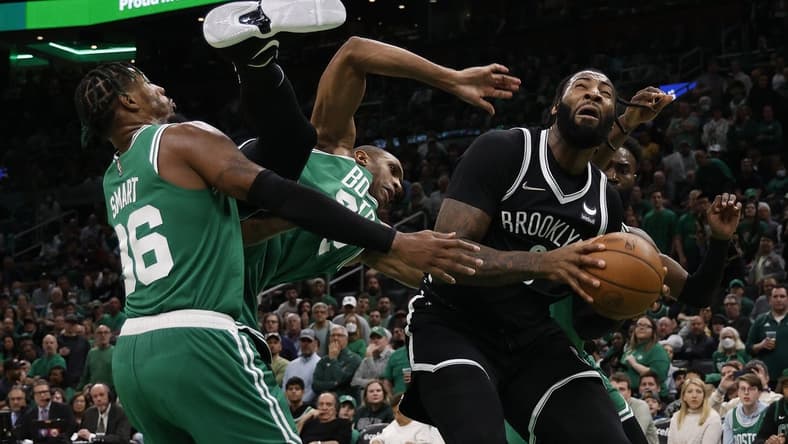 Apr 20, 2022; Boston, Massachusetts, USA; Boston Celtics center Al Horford (42) goes tumbling between guard Marcus Smart (36) and Brooklyn Nets center Andre Drummond (0) during the third quarter of game two of the first round of the 2022 NBA playoffs at TD Garden. Mandatory Credit: Winslow Townson-USA TODAY Sports