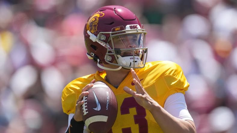 Apr 23, 2022; Los Angeles, CA, USA; Southern California Trojans quarterback Caleb Williams (13) throws the ball during the spring game at the Los Angeles Memorial Coliseum. Mandatory Credit: Kirby Lee-USA TODAY Sports