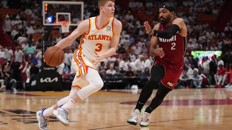 Apr 26, 2022; Miami, Florida, USA; Atlanta Hawks guard Kevin Huerter (3) drives the ball around Miami Heat guard Gabe Vincent (2) during the second half in game five of the first round for the 2022 NBA playoffs at FTX Arena. Mandatory Credit: Jasen Vinlove-USA TODAY Sports