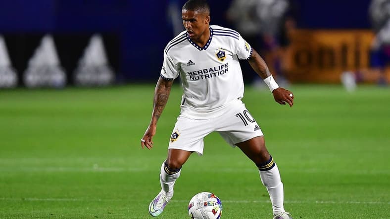 May 14, 2022; Carson, California, USA; Los Angeles Galaxy forward Douglas Costa (10) controls the ball against FC Dallas during the second half at Dignity Health Sports Park. Mandatory Credit: Gary A. Vasquez-USA TODAY Sports