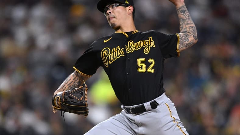 May 28, 2022; San Diego, California, USA; Pittsburgh Pirates relief pitcher Anthony Banda (52) throws a pitch against the San Diego Padres during the eighth inning at Petco Park. Mandatory Credit: Orlando Ramirez-USA TODAY Sports