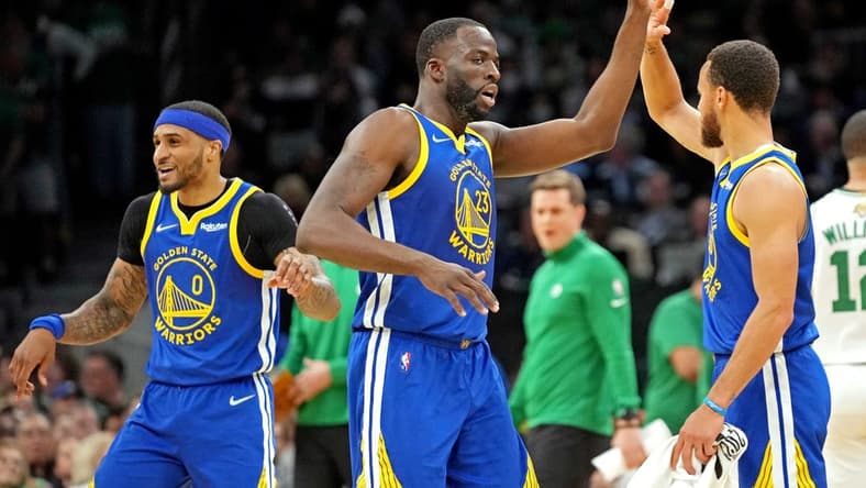Jun 16, 2022; Boston, Massachusetts, USA; Golden State Warriors forward Draymond Green (23) reacts with guard Stephen Curry (30) during the second quarter against the Boston Celtics in game six of the 2022 NBA Finals at TD Garden. Mandatory Credit: Kyle Terada-USA TODAY Sports
