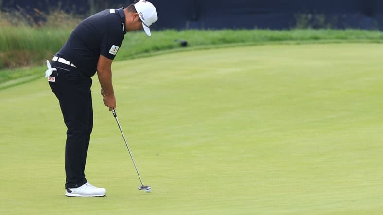 Jun 17, 2022; Brookline, Massachusetts, USA; Sungjae Im putts on the 17th green during the second round of the U.S. Open golf tournament. Mandatory Credit: Aaron Doster-USA TODAY Sports