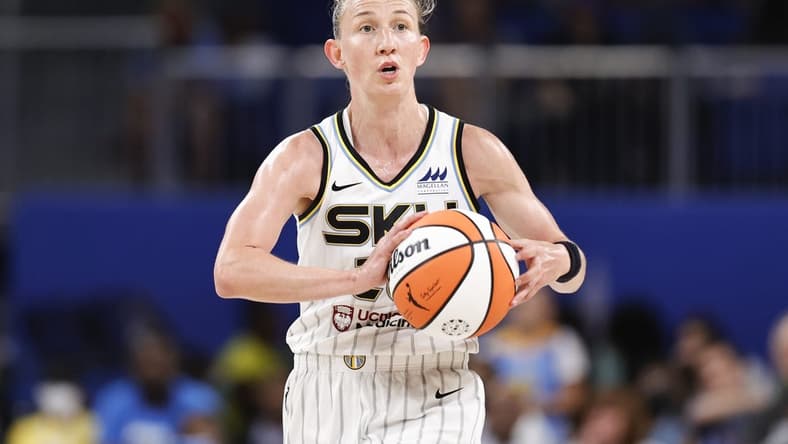 Jun 17, 2022; Chicago, Illinois, USA; Chicago Sky guard Courtney Vandersloot (22) looks to pass the ball against the Atlanta Dream during the second half of a WNBA game at Wintrust Arena. Mandatory Credit: Kamil Krzaczynski-USA TODAY Sports