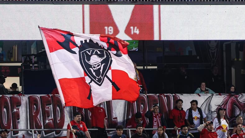 Jun 22, 2022; Harrison, NJ, United States; New York Red Bulls fans wave a flag during the first half against New York City FC at Red Bull Arena. Mandatory Credit: Vincent Carchietta-USA TODAY Sports