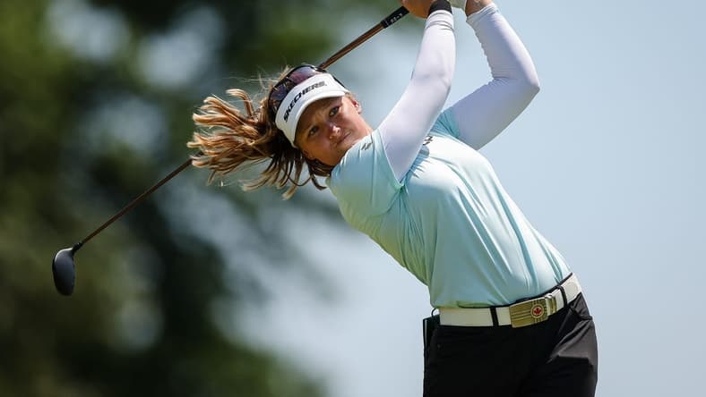 Jun 26, 2022; Bethesda, Maryland, USA; Brooke Henderson plays her shot from the 15th tee during the final round of the KPMG Women's PGA Championship golf tournament at Congressional Country Club. Mandatory Credit: Scott Taetsch-USA TODAY Sports