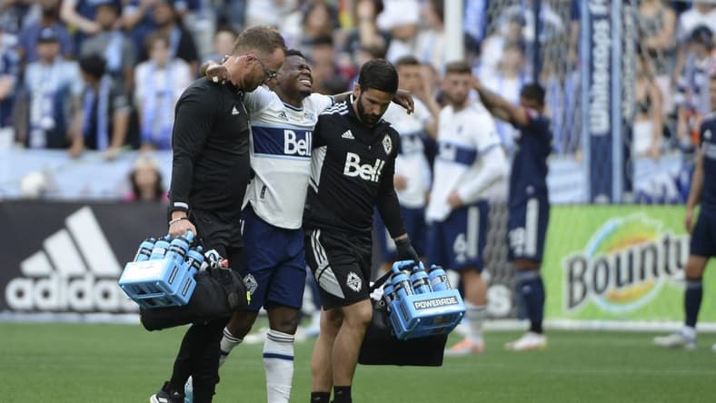 Jun 26, 2022; Vancouver, British Columbia, CAN;  Vancouver Whitecaps forward Deiber Caicedo (7) is taken off the field during the first half against the New England Revolution at BC Place. Mandatory Credit: Anne-Marie Sorvin-USA TODAY Sports