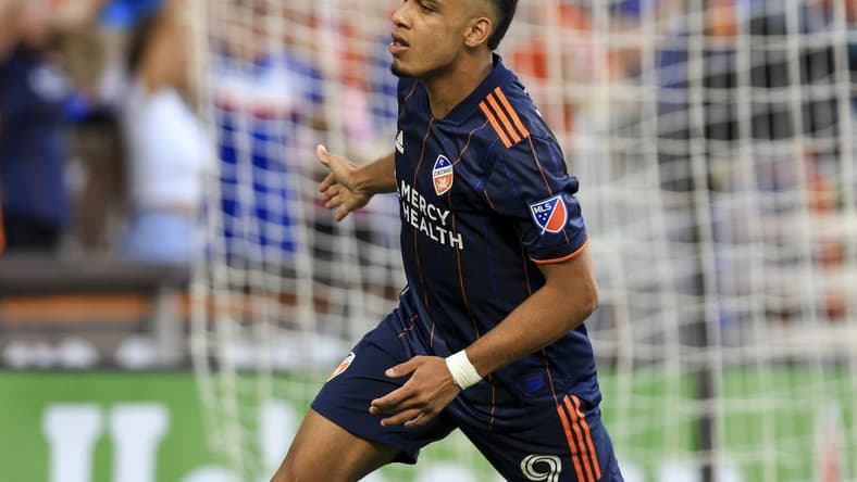 Jun 29, 2022; Cincinnati, Ohio, USA; FC Cincinnati forward Brenner (9) celebrates scoring a goal against New York City FC in the first half at TQL Stadium. Mandatory Credit: Aaron Doster-USA TODAY Sports