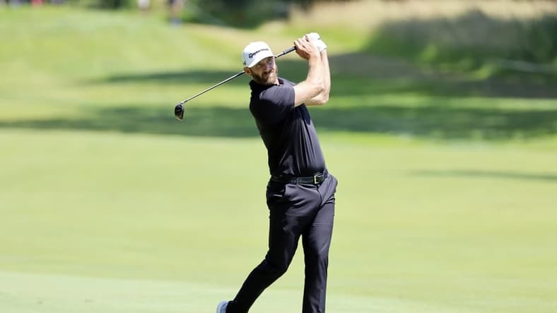 Jul 1, 2022; Portland, Oregon, USA; Dustin Johnson hits from the fairway on the fifth hole during the second round of the LIV Golf tournament at Pumpkin Ridge Golf Club. Mandatory Credit: Soobum Im-USA TODAY Sports