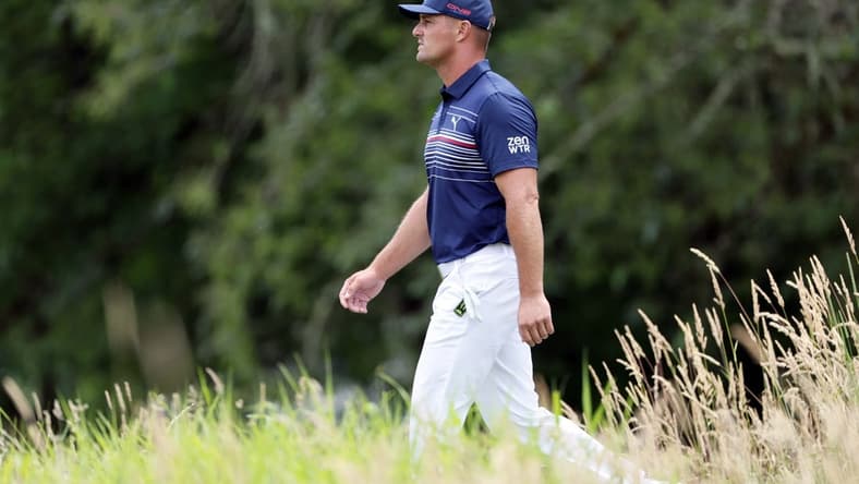 Jul 2, 2022; Portland, Oregon, USA; Bryson DeChambeau walks up the fairway on the seventh hole during the final round of the LIV Golf tournament at Pumpkin Ridge Golf Club. Mandatory Credit: Soobum Im-USA TODAY Sports