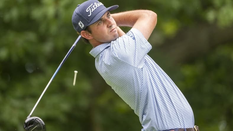 Jul 2, 2022; Silvis, Illinois, USA; J.T. Poston hits his tee shot on the 2nd hole during the third round of the John Deere Classic golf tournament. Mandatory Credit: Marc Lebryk-USA TODAY Sports