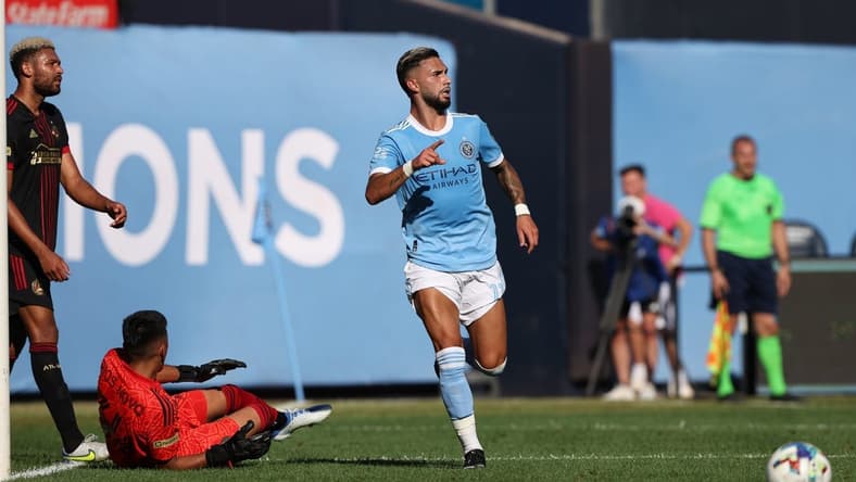 Jul 3, 2022; New York, New York, USA; New York City FC midfielder Valentin Castellanos (11) celebrates his goal  past Atlanta United goalkeeper Rocco Rios Novo (34) during the first half at Yankee Stadium. Mandatory Credit: Vincent Carchietta-USA TODAY Sports