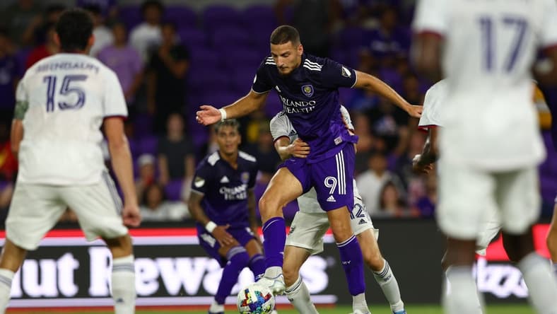 Jul 4, 2022; Orlando, Florida, USA; Orlando City forward Ercan Kara (9) controls the ball against D.C. United in the second half at Exploria Stadium. Mandatory Credit: Nathan Ray Seebeck-USA TODAY Sports
