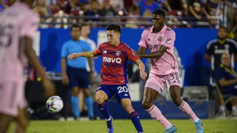 Jul 4, 2022; Frisco, Texas, USA; FC Dallas forward Alan Velasco (20) and Inter Miami defender Damion Lowe (31) look for the ball during the first half at Toyota Stadium. Mandatory Credit: Jerome Miron-USA TODAY Sports