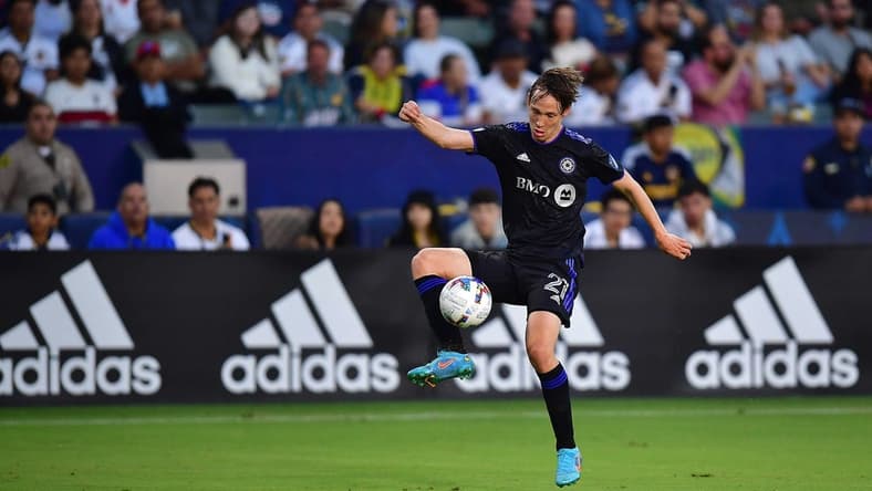 Jul 4, 2022; Carson, California, USA; CF Montreal midfielder Lassi Lappalainen (21) controls the ball against Los Angeles Galaxy during the first half at Dignity Health Sports Park. Mandatory Credit: Gary A. Vasquez-USA TODAY Sports