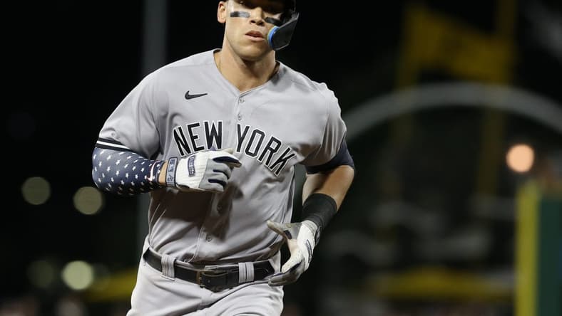 Jul 6, 2022; Pittsburgh, Pennsylvania, USA; New York Yankees center fielder Aaron Judge (99) rounds the bases after hitting a grand slam home run against the Pittsburgh Pirates during the eighth inning at PNC Park. Mandatory Credit: Charles LeClaire-USA TODAY Sports