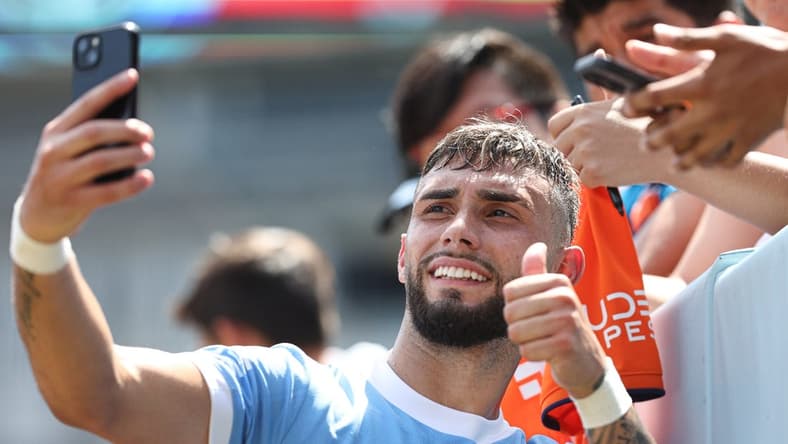 Jul 9, 2022; New York, New York, USA; New York City FC forward Valentin Castellanos (11) takes a selfie with fans after the game against the New England Revolution at Yankee Stadium. Mandatory Credit: Vincent Carchietta-USA TODAY Sports