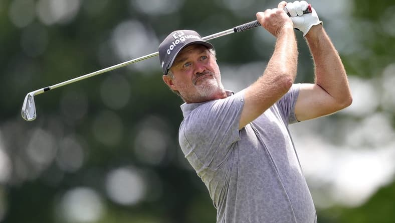 Jerry Kelly watches his shot down the fairway on the 15th hole during third round of the Bridgestone Senior Players Championship at Firestone Country Club on Saturday.

Bridgestone 3