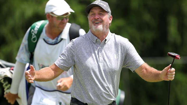 Jerry Kelly laughs as his putt fails to fall into the 15th hole during third round of the Bridgestone Senior Players Championship at Firestone Country Club on Saturday.

Bridgestone 4