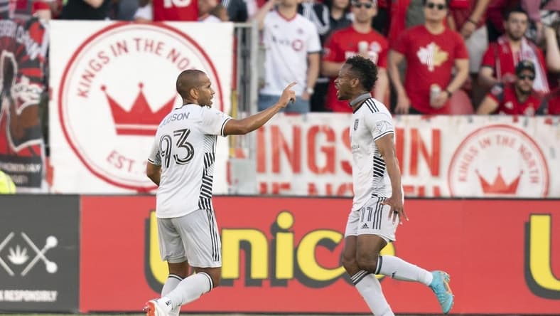 Jul 9, 2022; Toronto, Ontario, CAN; San Jose Earthquakes forward Jeremy Ebobisse (11) scores a goal and celebrates with San Jose Earthquakes midfielder Judson (93) against Toronto FC during the first half at BMO Field. Mandatory Credit: Nick Turchiaro-USA TODAY Sports