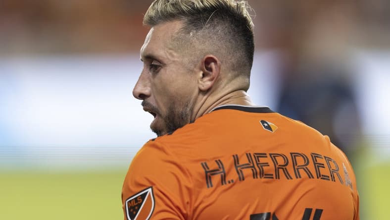 Jul 9, 2022; Houston, Texas, USA; Houston Dynamo midfielder Hector Herrera (16) after a water break against the FC Dallas in the second half at PNC Stadium. Mandatory Credit: Thomas B. Shea-USA TODAY Sports