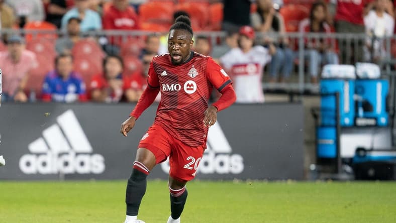 Jul 9, 2022; Toronto, Ontario, CAN; Toronto FC forward Ayo Akinola (20) controls the ball against the San Jose Earthquakes during the second half at BMO Field. Mandatory Credit: Nick Turchiaro-USA TODAY Sports