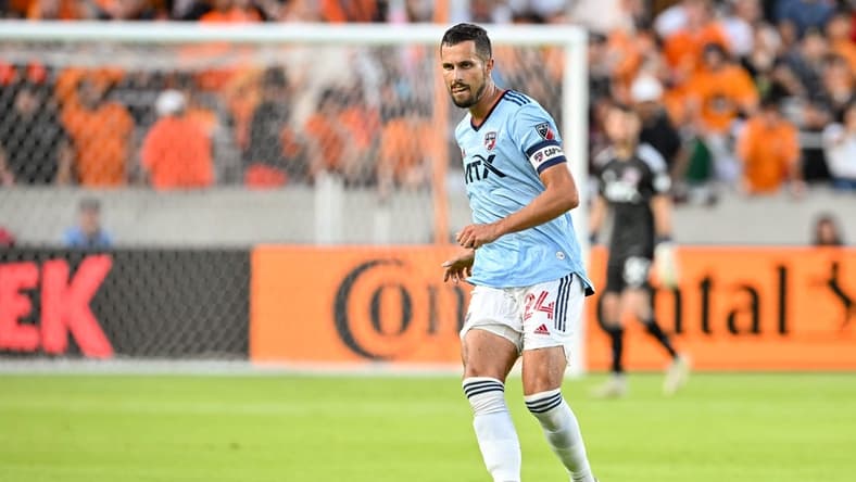 Jul 9, 2022; Houston, Texas, USA; FC Dallas defender Matt Hedges (24) passes the ball during the first half against the Houston Dynamo FC at PNC Stadium. Mandatory Credit: Maria Lysaker-Houston Dynamo FC-USA TODAY Sports