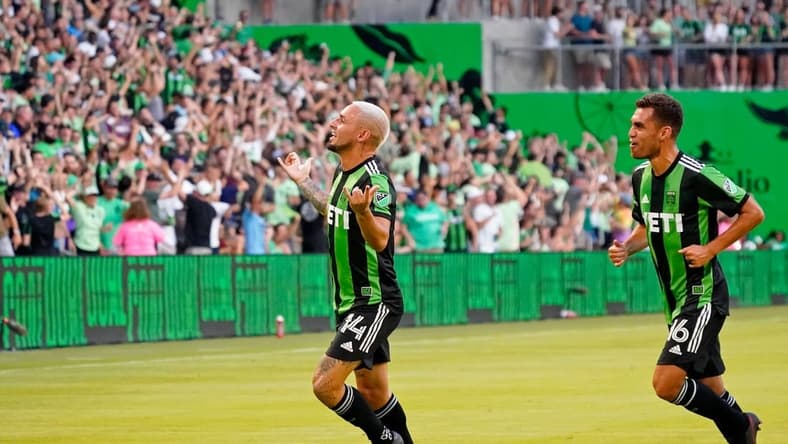 Jul 12, 2022; Austin, Texas, USA; Austin FC forward Diego Fagundez (14) celebrates after scoring a goal against the Houston Dynamo during the first half at Q2 Stadium. Mandatory Credit: Scott Wachter-USA TODAY Sports