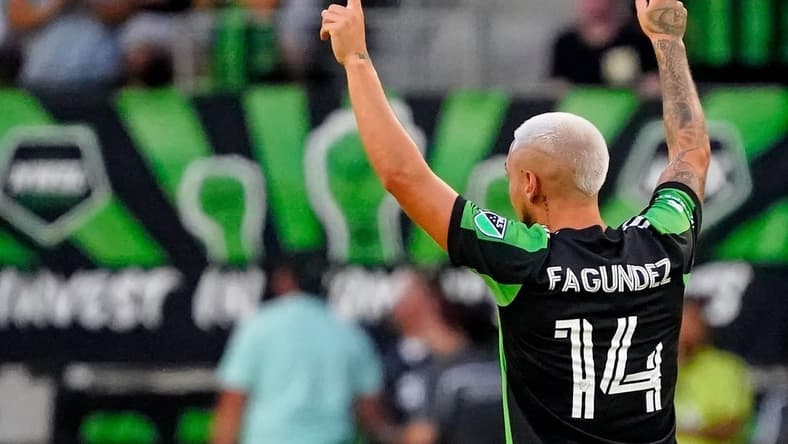 Jul 12, 2022; Austin, Texas, USA; Austin FC forward Diego Fagundez (14) celebrates after scoring a goal against the Houston Dynamo during the first half at Q2 Stadium. Mandatory Credit: Scott Wachter-USA TODAY Sports
