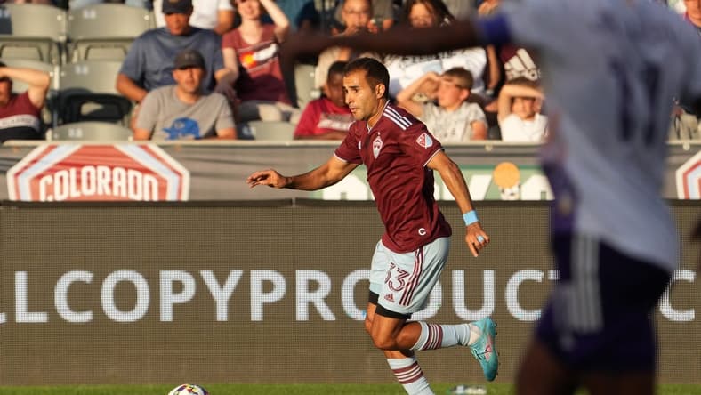 Jul 13, 2022; Commerce City, Colorado, USA; Colorado Rapids defender Steven Beitashour (33) drives to the net in the first half against the Orlando City at Dick's Sporting Goods Park. Mandatory Credit: Ron Chenoy-USA TODAY Sports