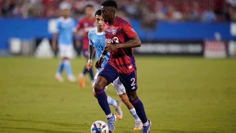 Jul 13, 2022; Frisco, Texas, USA; FC Dallas defender Eddie Munjoma (2) controls the ball against New York City FC midfielder Nicolas Acevedo (26) during the first half at Toyota Stadium. Mandatory Credit: Chris Jones-USA TODAY Sports